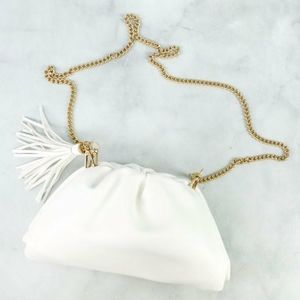 Understated Leather Crescent Clutch